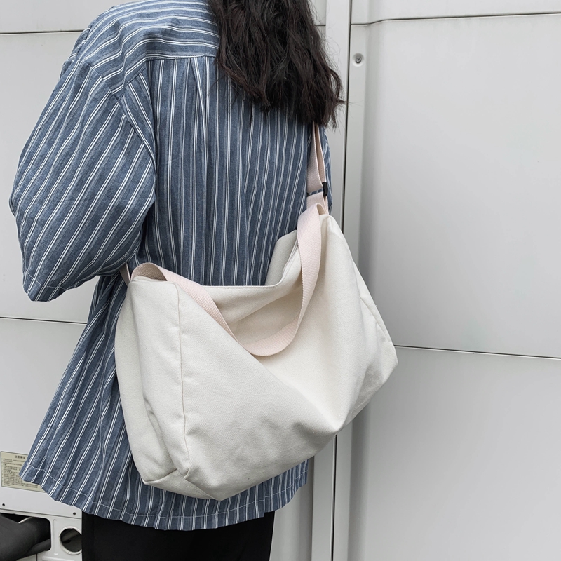 日系简约百搭纯色帆布包男港风原宿大容量单肩斜挎包女学生潮 ins 日系简约百搭纯色帆布包男港风原宿大容量单肩斜挎包女学生潮 ins