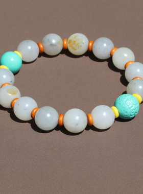 新疆和田玉籽料挂金皮青花籽手串