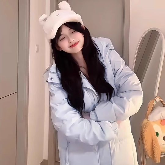 Los populares abrigos de algodón largos hasta la rodilla de estilo coreano de este año