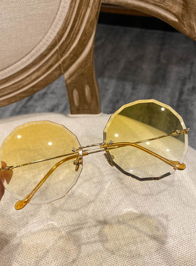 圆形无边框波浪纹墨镜黄色抖音