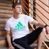 Adidas adidas nam và nữ tay áo ngắn mới cổ tròn xu hướng nam giản dị nửa áo thun thể thao - Áo phông thể thao áo thun nam thể thao Áo phông thể thao