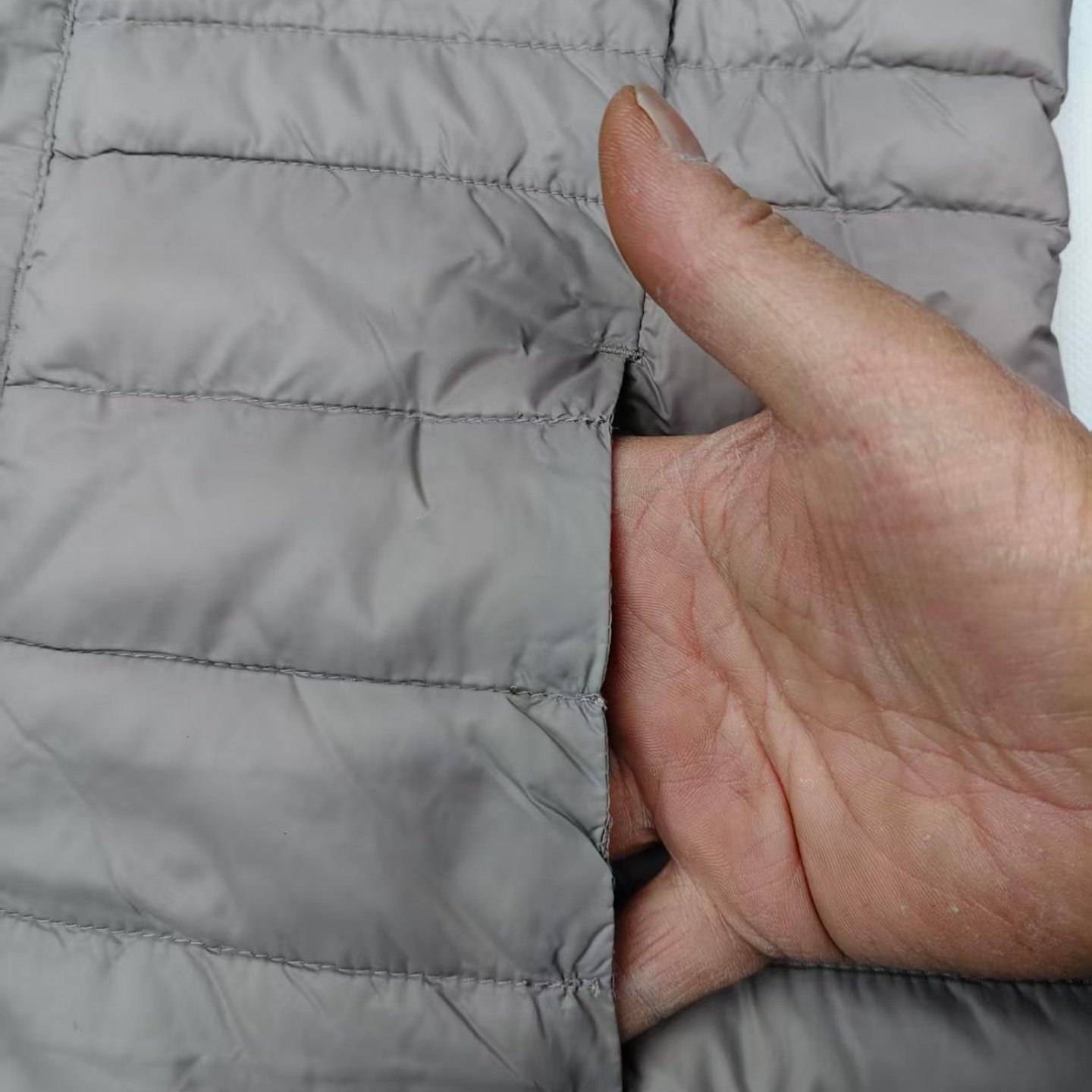 尾单冬季女款羽绒马甲白鹅绒纯色休闲背心直筒宽松马夹,淘宝优惠券,粉丝福利购,淘宝优惠卷