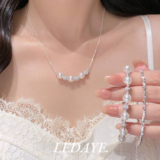 Uncle Li's shop diamond ball spaced pearl stacking bracelet