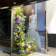 Light luxury glass showcases simulated green plants and decorative landscaping