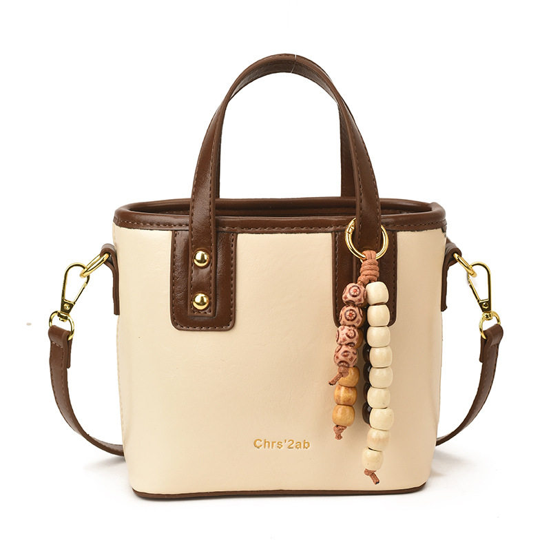 手提包包女式2026新款潮小众高级感轻奢百搭单肩包精致斜挎水桶包,淘宝优惠券,粉丝福利购,淘宝优惠卷