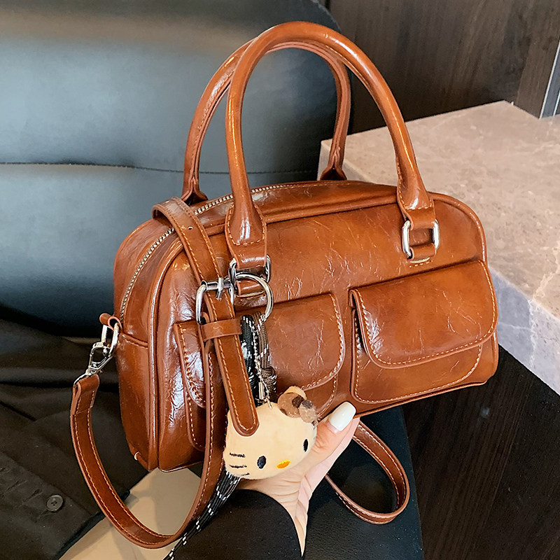 小众高级感复古保龄球包女包2025新款百搭通勤包大容量手提斜挎包,淘宝优惠券,粉丝福利购,淘宝优惠卷