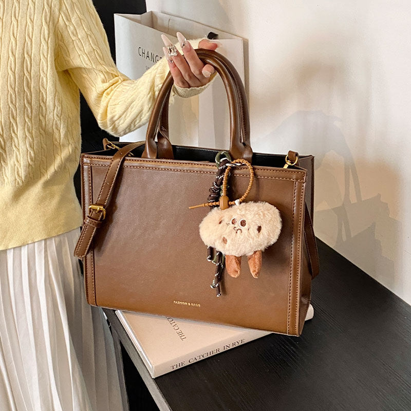 通勤复古手提公文包女士2025新款休闲时尚大容量托特包单肩斜挎包,淘宝优惠券,粉丝福利购,淘宝优惠卷