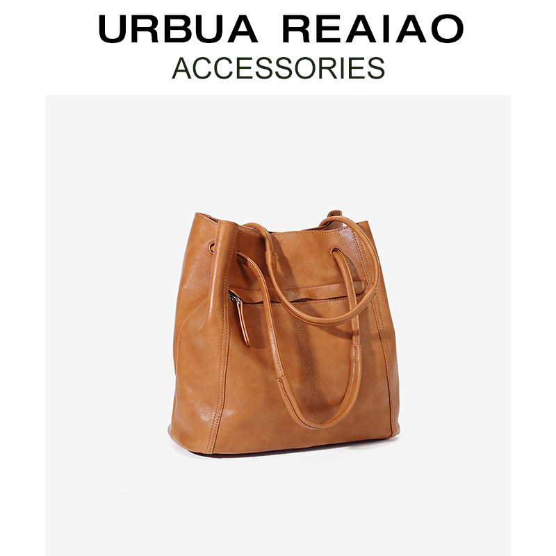 大容量真皮水桶包女2025新款复古通勤托特包植鞣头层牛皮单肩大包 - 图0