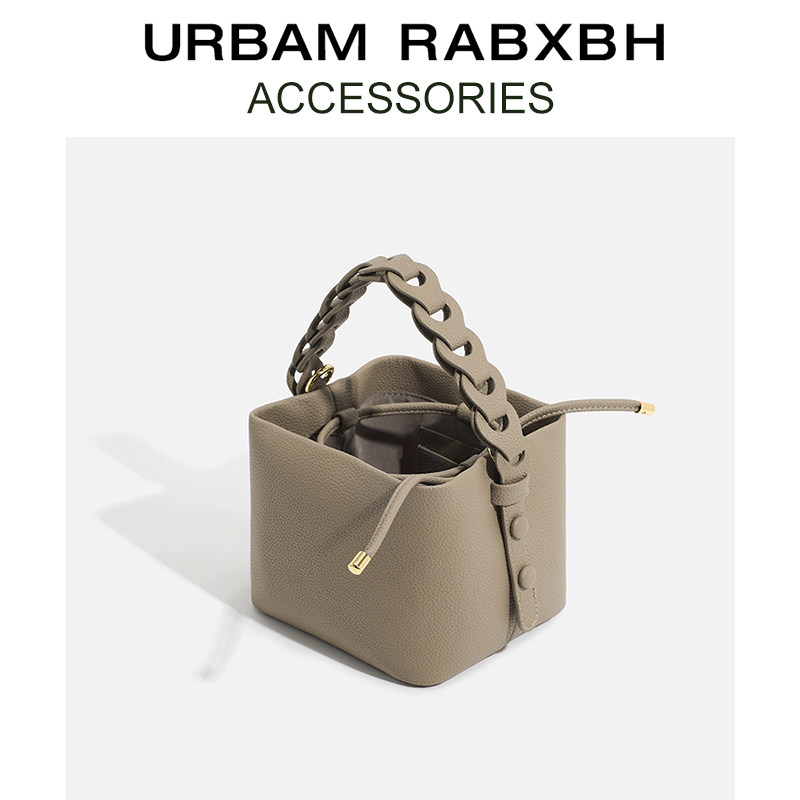 原创设计真皮手提小包包2025春季新款小众编织水桶包高级感斜挎包,淘宝优惠券,粉丝福利购,淘宝优惠卷