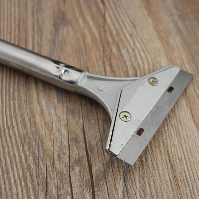 Extended stainless steel cleaning wall tile spade
