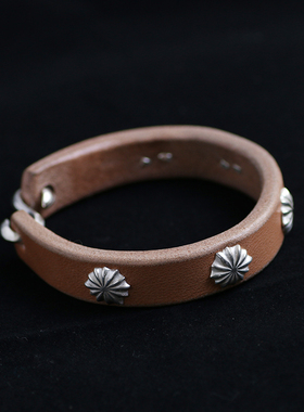 制作一休枥木鞍革菊花钉情侣手环