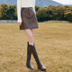 Betu Baitu Retro Maillard Hip Short Skirt Skirt ແມ່ຍິງ 2025 ລະດູຫນາວໃຫມ່ຮ້ອນເດັກຍິງກະໂປງຫນັງຂະຫນາດນ້ອຍ