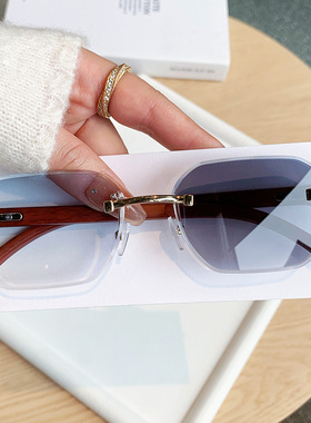 欧美时尚新款无框切边变色太阳镜时尚街拍高级感墨镜木纹腿潮眼镜