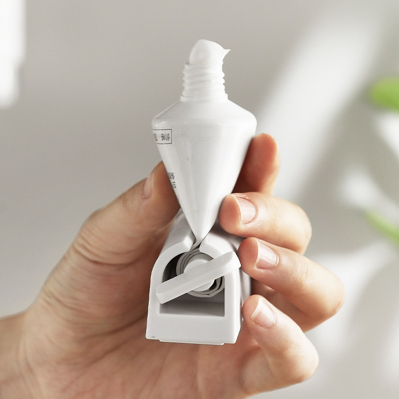 镜柜下磁吸挤牙膏器洗面奶挤压夹牙刷杯置物架浴室柜牙膏收纳神器,淘宝优惠券,粉丝福利购,淘宝优惠卷