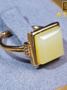 方言且末冰底鸡油黄口银镶玉戒指