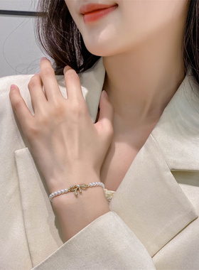2022年新款潮水钻蝴蝶结珍珠手链韩国东大门小众精致手作串珠手环