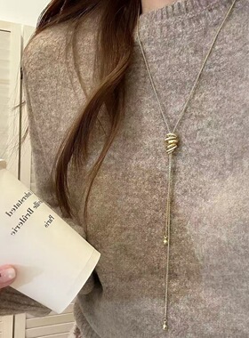 猫女的心事高级感金色缠绕丝带项链女高档轻奢秋冬毛衣链长款配饰