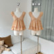 ເສື້ອຍືດບ່າບ່າດຽວ hem babydoll