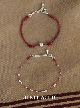 珍珠瑞雪编织纯银红绳双结手链