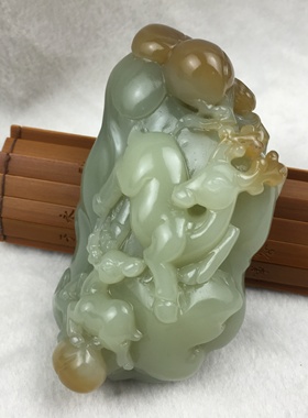 新疆和田玉若羌黄口料带红糖巧雕路路通