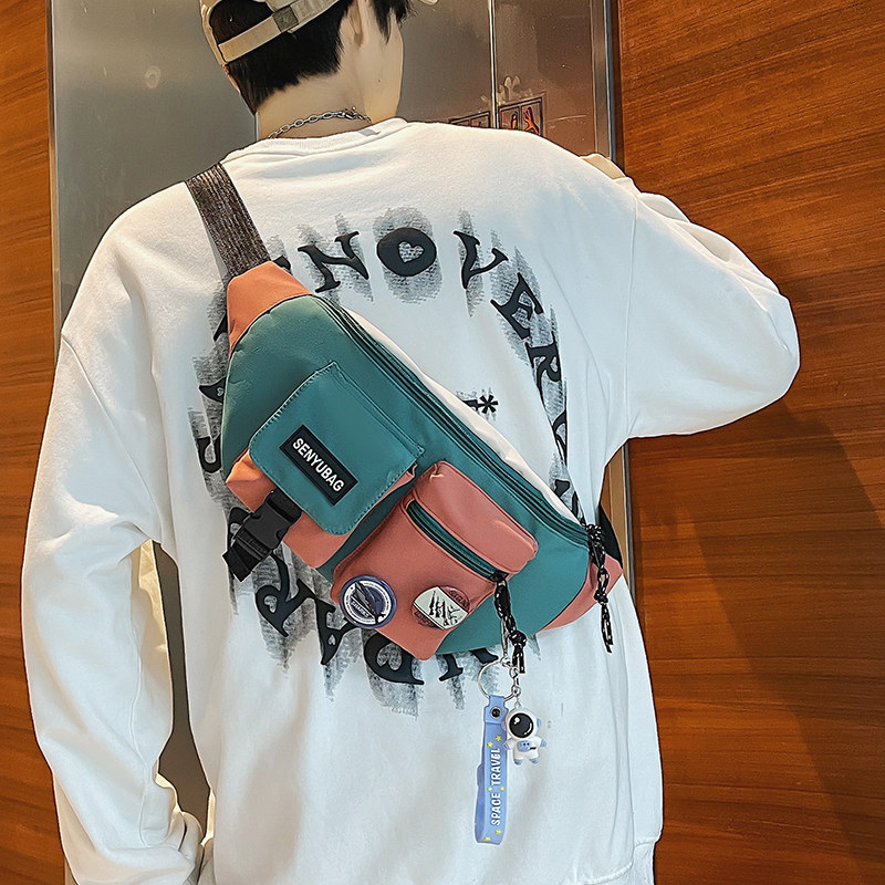 日系潮牌胸包女设计感小众斜挎包 大牙男士包袋