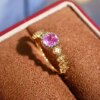 18K gold diamond inlaid natural padparadscha ring. The main stone is 0.81 carats. The crystal is rich and cool.