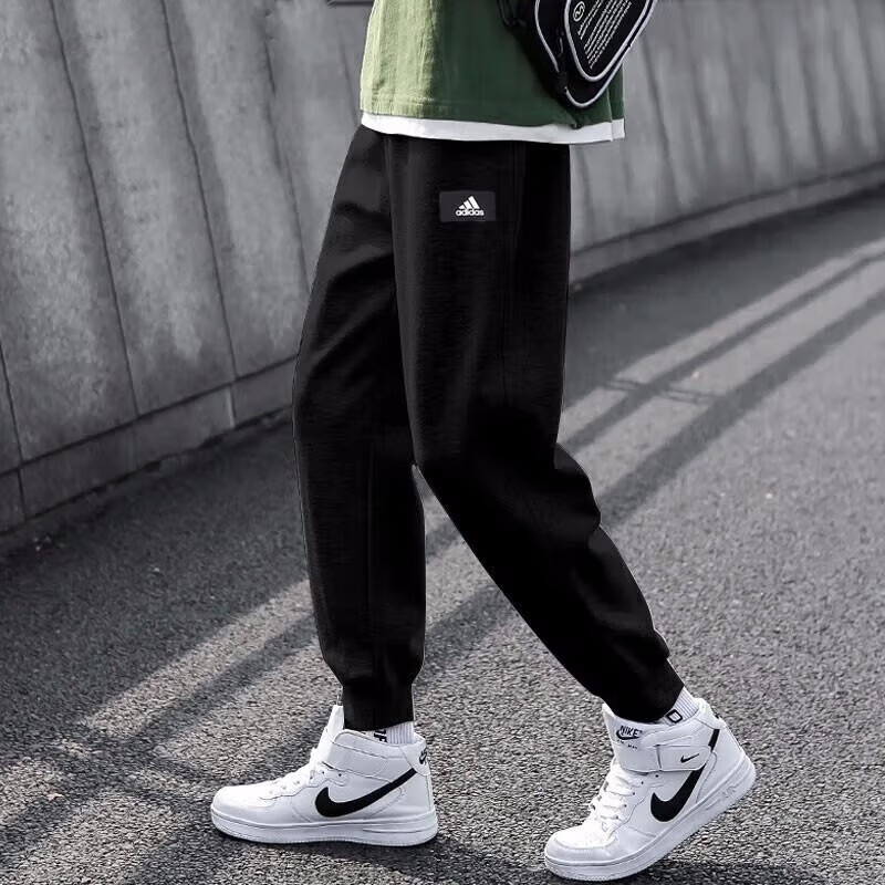 阿迪达斯运动裤男裤秋季新款休闲裤针织透气卫裤小脚裤长裤HE2225 - 图1