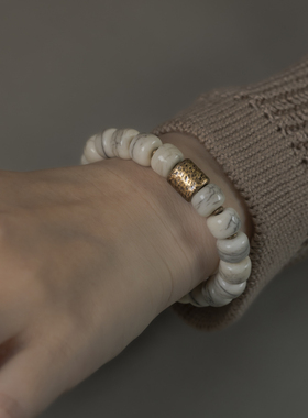 曲尾花原创设计老型珠牛骨手串