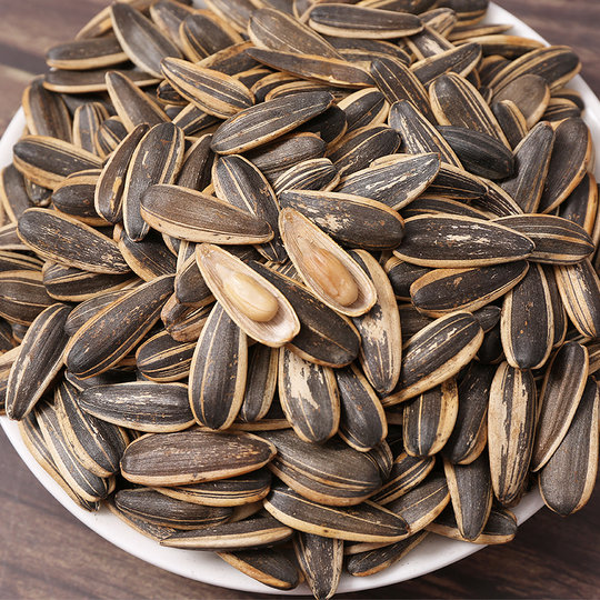 Slim hands melon seeds 1kg independent small package caramel spiced pecan flavored melon seeds 2Jin Jin equal to 0.5kg nut snack food roasted seeds and nuts