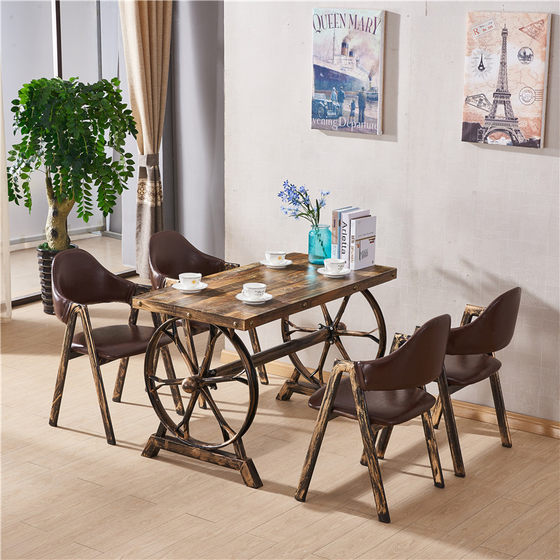 Retro industrial style themed bar and restaurant table and chair combination