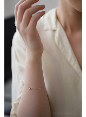 S925纯银镀14K金精致蝴蝶结手链