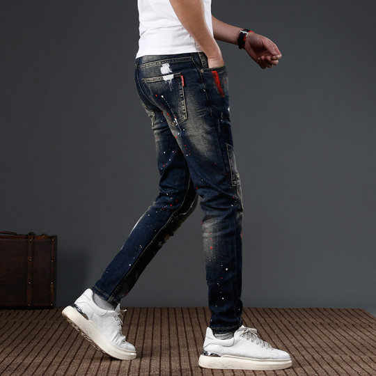 2025 new fashion niche design sense jeans men's ripped ink paint trendy brand slim feet pants men
