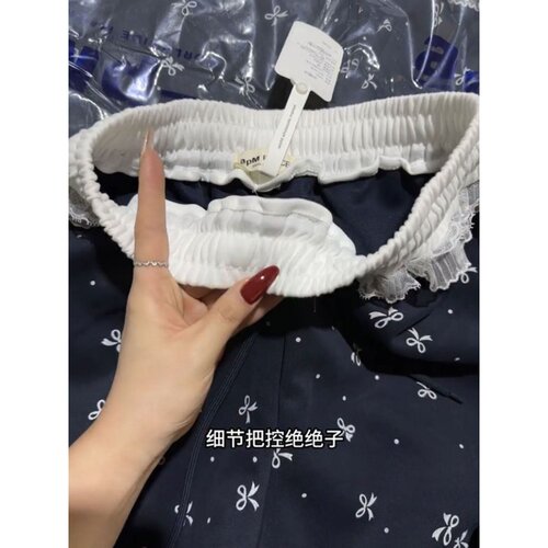 奥特莱斯~尾货品牌拼接蕾丝花边蝴蝶结印花两穿弯刀卫裤女春秋季 - 图3