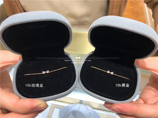 Браслет-бантик из 18-каратного золота с драгоценными камнями в форме сердечек