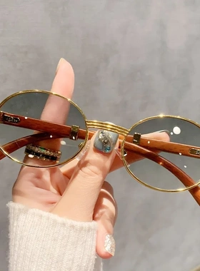 新款复古仿木纹太阳镜男椭圆墨镜女潮流欧美时尚防紫外线金属pc