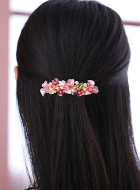 中年女士弹簧水钻盘发器梅花夹