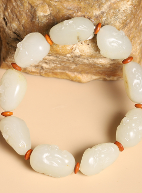 和田玉籽料留皮苏工十八罗汉手串