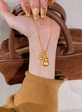 黄金色点钻拉丝小福袋项链