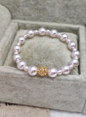 曼塔玫瑰色施家珍珠手链女 弹力绳手串叠戴百搭极简小众高级