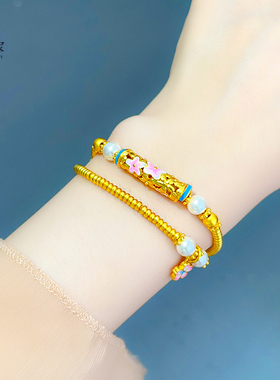 女沙金宋韵粉桃花镂空弯管手链