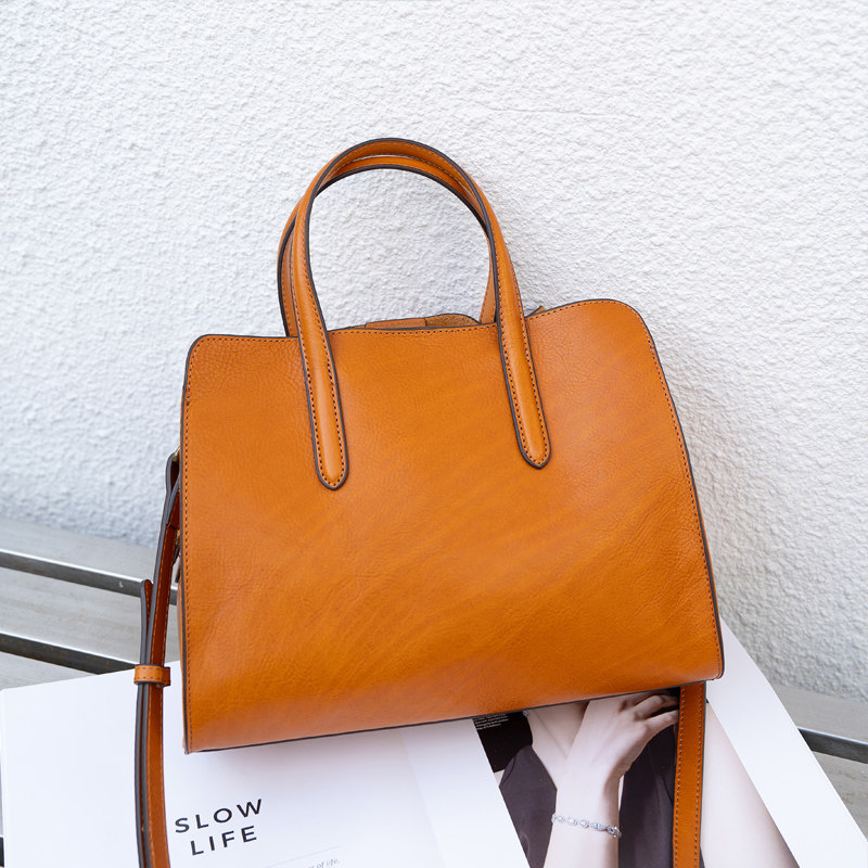 真皮大容量斜挎手提包2026春季新款简约纯牛皮托特包放雨伞包包女,淘宝优惠券,粉丝福利购,淘宝优惠卷
