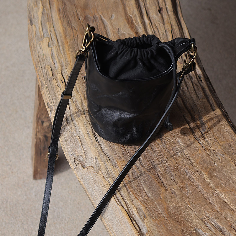 慢慢变蓝原创头层牛皮水桶包文艺复古单肩包斜挎水桶菜篮子带抽绳,淘宝优惠券,粉丝福利购,淘宝优惠卷