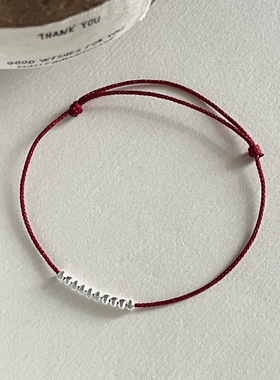 未晚女纯银猫眼珠车花球红绳手链