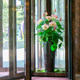 Hotel revolving door artificial flowers