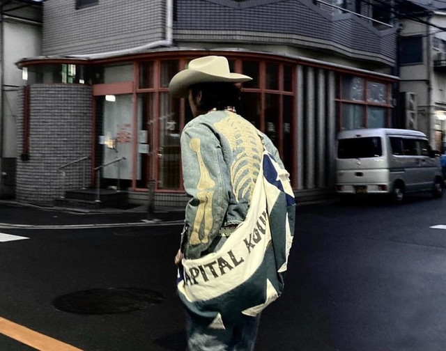 Collarless washed embroidered denim jacket