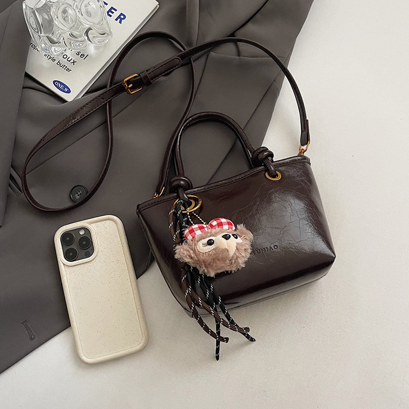 高级感复古斜挎包包女2025新款时尚百搭单肩包超火手提水桶包女包,淘宝优惠券,粉丝福利购,淘宝优惠卷