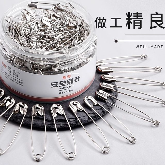 Old-fashioned safety pins fixed clothes buckle pins bed sheets