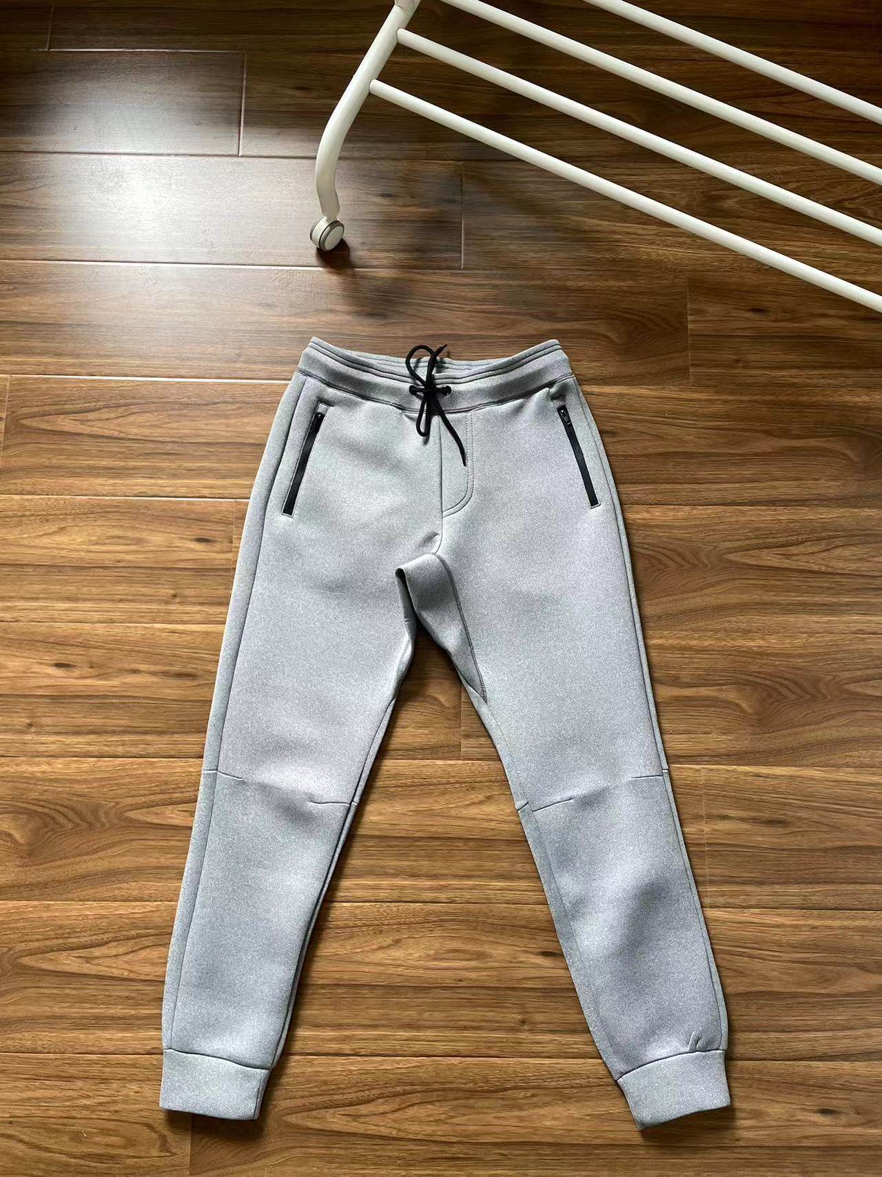 外贸日单 复古空气层卫裤男女情侣拉链口袋束脚运动休闲裤长裤,淘宝优惠券,粉丝福利购,淘宝优惠卷