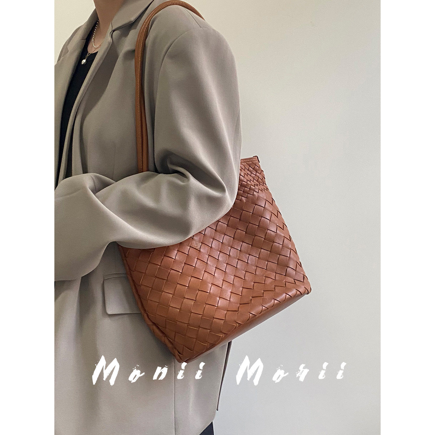 怪兽君包包2025新款水桶包通勤真皮单肩包大容量编织羊皮腋下包女,淘宝优惠券,粉丝福利购,淘宝优惠卷