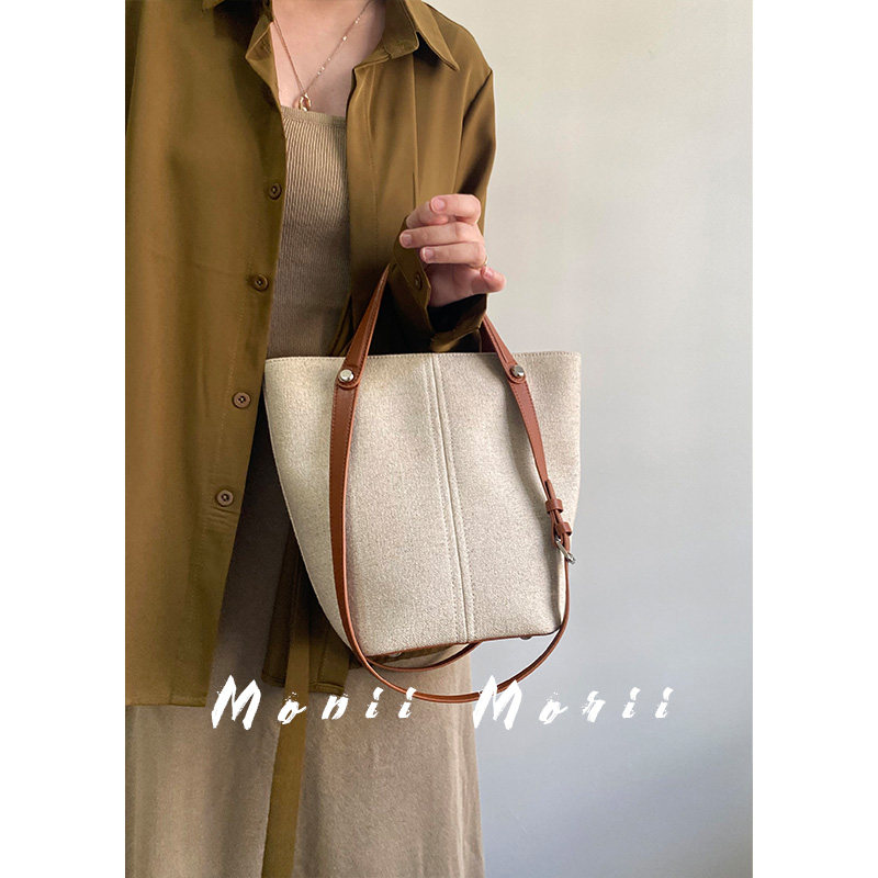 怪兽君包包2025新款水桶包时尚通勤单肩包百搭手提包复古菜篮子包,淘宝优惠券,粉丝福利购,淘宝优惠卷